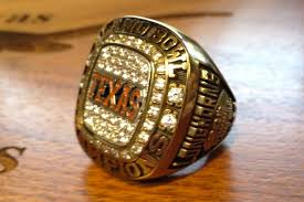 Make your championship ring recognizable at a glance with a diamond or stone top. Photo Mack Brown Rewards Texas With Alamo Bowl Rings Cbssports Com