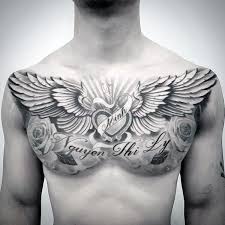 Top 39 Wing Chest Tattoo Ideas 2020 Inspiration Guide Cool Chest Tattoos Chest Tattoo Men Tattoo Designs Men