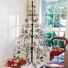 This practical and beautiful wrought iron christmas stocking. Wrought Iron Christmas Tree The Best Way To Showcase Your Most Treasured Ornaments Wrought Iron Christmas Tree Metal Ornament Tree Indoor Holiday Decor