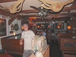 Simple wood chairs are cleverly spruced up with partial slipcovers. The Nautical Themed Dining Room Is Perfect For Old Salts Picture Of The Field Irish Pub Eatery Dania Beach Tripadvisor