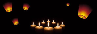 الدعاء جيوزهايجو شمعة في الغلاف الجوي خلفية سوداء tea lights candles candlelight