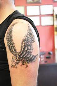 65 Small Eagle Tattoo Designs And Ideas For Men Style Gesture Small Eagle Tattoo Eagle Tattoo Designs Tattoos