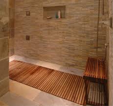 Anyone who places teak shower seats into their bathroom now realizes the dramatic effect that they have on the overall appearance of the place. Inset With Continuing Border Of Tile Teak Shower Floor Teak Bathroom Teak Shower Teak Shower Floor