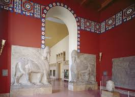 Reconstruction of an Assyrian palace room with door guardian figures ( Lamassu) and wall reliefs - Unknown — Google Arts & Culture