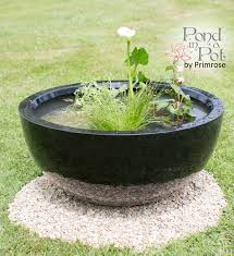 You can make them out of just about anything! H34cm Black Pond In A Pot Semi Shade Solar Water Feature 175 99