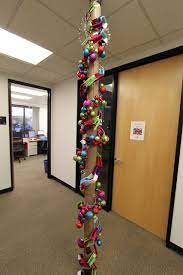 The cubes and office walls have been moved here and there over the decades. Office Christmas Pole Decorating Contest Office Christmas Decorations Office Christmas Christmas Cubicle Decorations