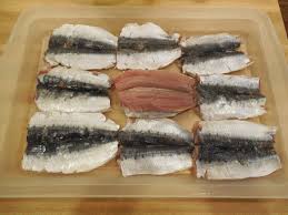 Real italian christmas eve dinner | today. Stuffed Calamari Fried Calamari And Stuffed Sardines For Your Italian Christmas Eve Learn Travel Italian Blog