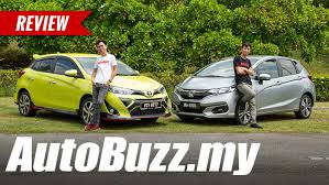 Новый yaris hybrid против honda jazz. Video Toyota Yaris Vs Honda Jazz Comparison Review Autobuzz My