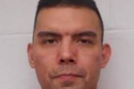 Man who sideswiped police car is still