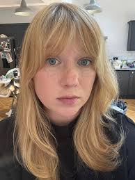 Would someone be able to change the background to plain please? The  passport office don't like it!