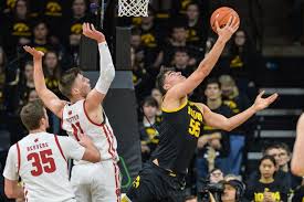 Maybe you would like to learn more about one of these? Wisconsin S Micah Potter Nate Reuvers Face Iowa S Luka Garza