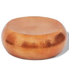 The decorative steel along the sides make the bottom of the side table look both open and closed at the same time. Hammered Aluminium Coffee Table Brass Copper Colour
