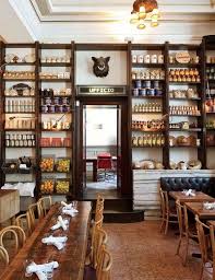 Colorfully Stocked Shelves Enliven The Italian Restaurant Terroni Restaurant Design Restaurant Interior Italian Interior Design