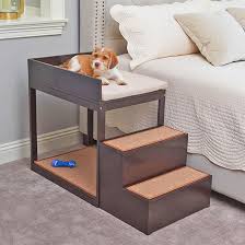 The best elevated dog beds are covered with a mesh like fabric that allows air to pass through so in a cold or draughty house, a blanket or this is the original elevated cooling dog bed*. The Bedside Bunk Elevated Dog Bed With Stairs Unicun