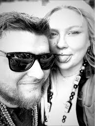 4 door car with sunroof and wall