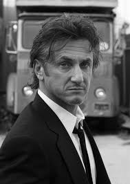 Sean Penn. i don't care what anyone says, he's always been mysteriously  good looking in my opinion.