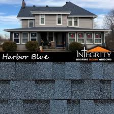 Steel doors are available in any style, from traditional to contemporary, and they do not warp like wood doors. Harbor Blue Shingles Shingling Blue Roof House Front
