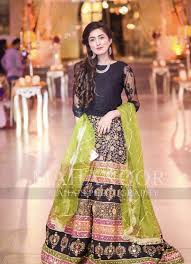 Indian and pakistani dresses are constantly known to be acclaimed for the way that they configuration bulldoze and most sleek and one of a kind gathering dresses for young ladies along with this new trend of a short shirt and tight trousers, girls and ladies are still following the old trend in both countries. Mehndi Dresses Simple Mehndi Dresses Girls Designer Dresses Pakistani Wedding Dresses