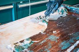 Here is how to remove spray paint without damaging your things: How To Strip Paint From Wood Furniture At Charlotte S House