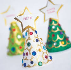 Decorate your christmas dinner table by making place cards for each of your guests. Kid Friendly Holiday Crafts Homemade Christmas Decorations Holiday Crafts Holiday Crafts For Kids