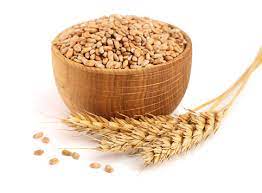 Wheat Spike And Wheat Grain In A Wooden Bowl Isolated On White Background  Stock Photo - Download Image Now - iStock