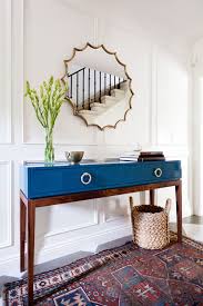 This Insanely Chic L A Home Will Give You Goosebumps Entry Table Decor Blue Console Table Foyer Decorating