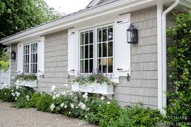 Window boxes are the perfect way to bring spring blooms up to eye level. How Window Shutters And Planter Boxes Transformed The Exterior Of My House Sanctuary Home Decor