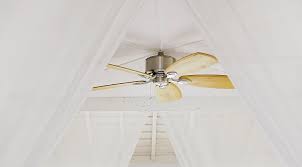 To clean a ceiling fan, start by using a dusting attachment on your vacuum and carefully running it along the fan blades. Sxfnhqg0mjmxnm