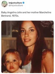 Baby Angelina Jolie with her mother Marcheline Bertrand in 1976. A quiet  moment between two people whose bond shaped Angelina's entire life. Before  fame, before films, before the headlines, there was just