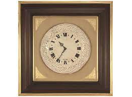 La Cornice In Legno Di Colore Noce E Decorazioni Dorate Si Adatta Ad Ambienti Classici Eleganti L Orologio In Decorazioni In Rilievo Cornici In Legno Cornici