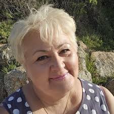 What are some reasonably priced groomer recommendations for an anxious  springer spaniel in the area?