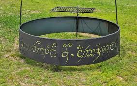 One ring to rule them all, one ring to find them, one ring to bring them all and in the warmth of the fire pit, roast some marshmallows, and possibly bbq some steaks on the swing out grill. This Lord Of The Rings Fire Pit Is One Pit To Rule Them All
