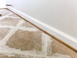 But this assumes that the floor underneath is solid (concrete) and that there are no cracks in the existing tile (indicating underlying problems in the concrete). How To Install Sheet Vinyl Flooring Over Tile Bless Er House