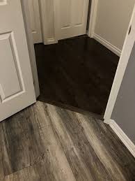 The days of smooth and shiny are gone. All Wood Floors Are Protected By A Clear Coating That Eventually Becomes Scrat Flooring Transition Flooring Living Room Flooring