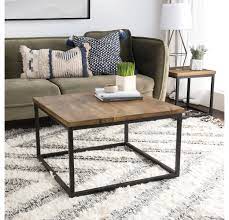 The most common coffee table stand material is wood. Wooden Top And Iron Base Pierce Coffee Table Kirklands