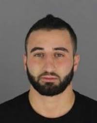 Man arraigned in parking lot gunfire incident