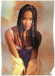 This hairstyle has some simple braids but with different colored extensions. Naomi Campbell Golden Hour Poster By T R I N A Most Beautiful Black Women Braids For Black Women Black Women Hairstyles