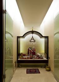 A lamp is lit and the lord worshipped each day. Puja Room Design In House