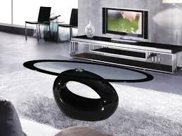 Clear tempered glass top with 1.25 beveled edge. Cairo Oval Black High Gloss Clear Glass Coffee Table Homegenies