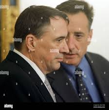 Iraq expert Peter Galbraith, left, confers with President Pro Tem Peter  Shumlin before he speaks to the Legislature about what he sees as the  conclusion of the war in Iraq during a