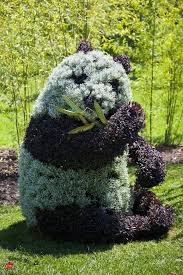 Gartenfiguren Aus Pflanzen Wunderliche Gartenkunst In Atlanta Gartenkunst Pflanzen Gartenfiguren