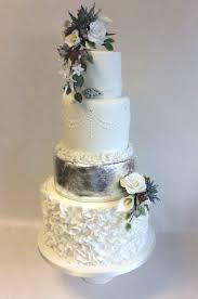 Winter Sparkle Ruffles And Silver Leaf With Seasonal Wired Sugar Flower Sprays Winter Wedding Cake Wedding Cake Toppers Buttercream Wedding Cake