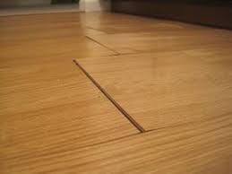 How To Clean Laminate Floors Less Water Is Best How To Clean Laminate Flooring Clean Laminate Cleaning Laminate Wood Floors