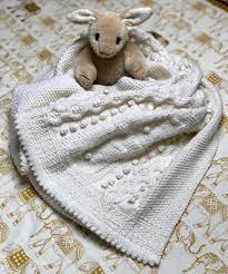 Stripes that are incorporated with the tuck stitch, turn into squeezable bobbles of color on this blankie that stimulates the curious child while keeping them. Bobble Bunny Baby Blanket Knitting Pattern