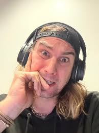 An Amish Man does stand up