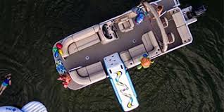 Typically, these slides strap to the side of your pontoon and support somewhere around 250 pounds. Amazon Com Rave Sports Pontoon Slide 10 Ft Toys Games