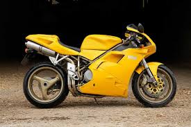 Image result for Nuget Yellow 1999 Motorcycle