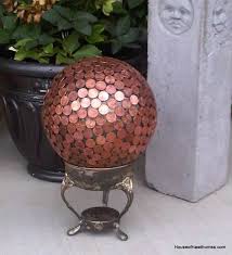 You can add mosaic design to garden balls. Mosaic Bowling Ball Yard Art House Of Hawthornes
