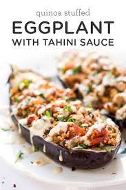 Quinoa Stuffed Eggplant With Tahini Sauce Simply Quinoa Recipe Eggplant Recipes Healthy Recipes Recipes