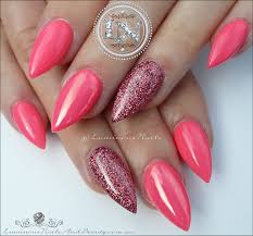 However, not everyone wants to rock super long talons. Luminous Nails Gorgeous Coral Glittery Rose Pink Glitter Acrylic Nails